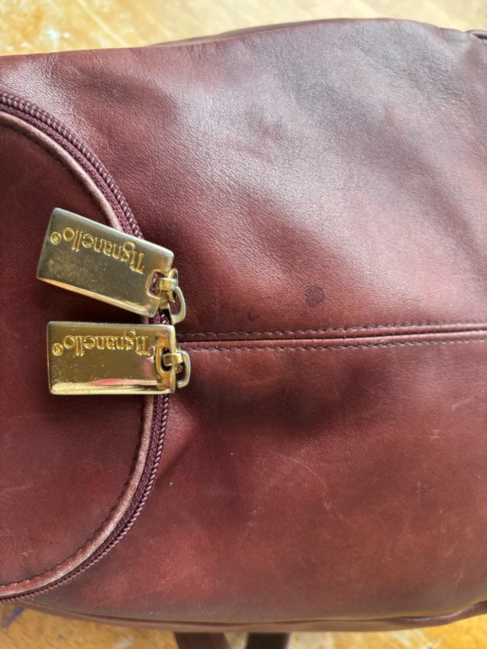 Tiganello Smooth Leather Backpack in Dark Brown with Gold Accent